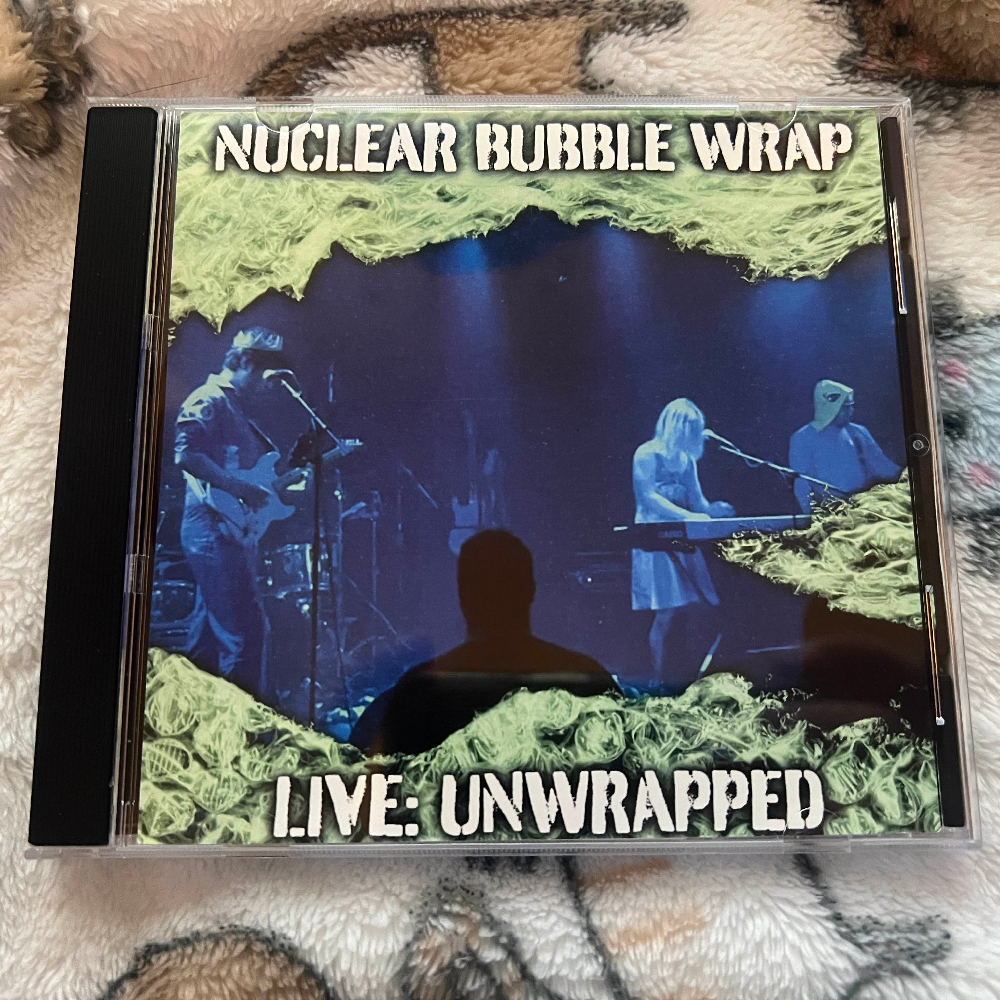 Photograph of a CD of Live: Unwrapped ''by'' Nuclear Bubble Wrap