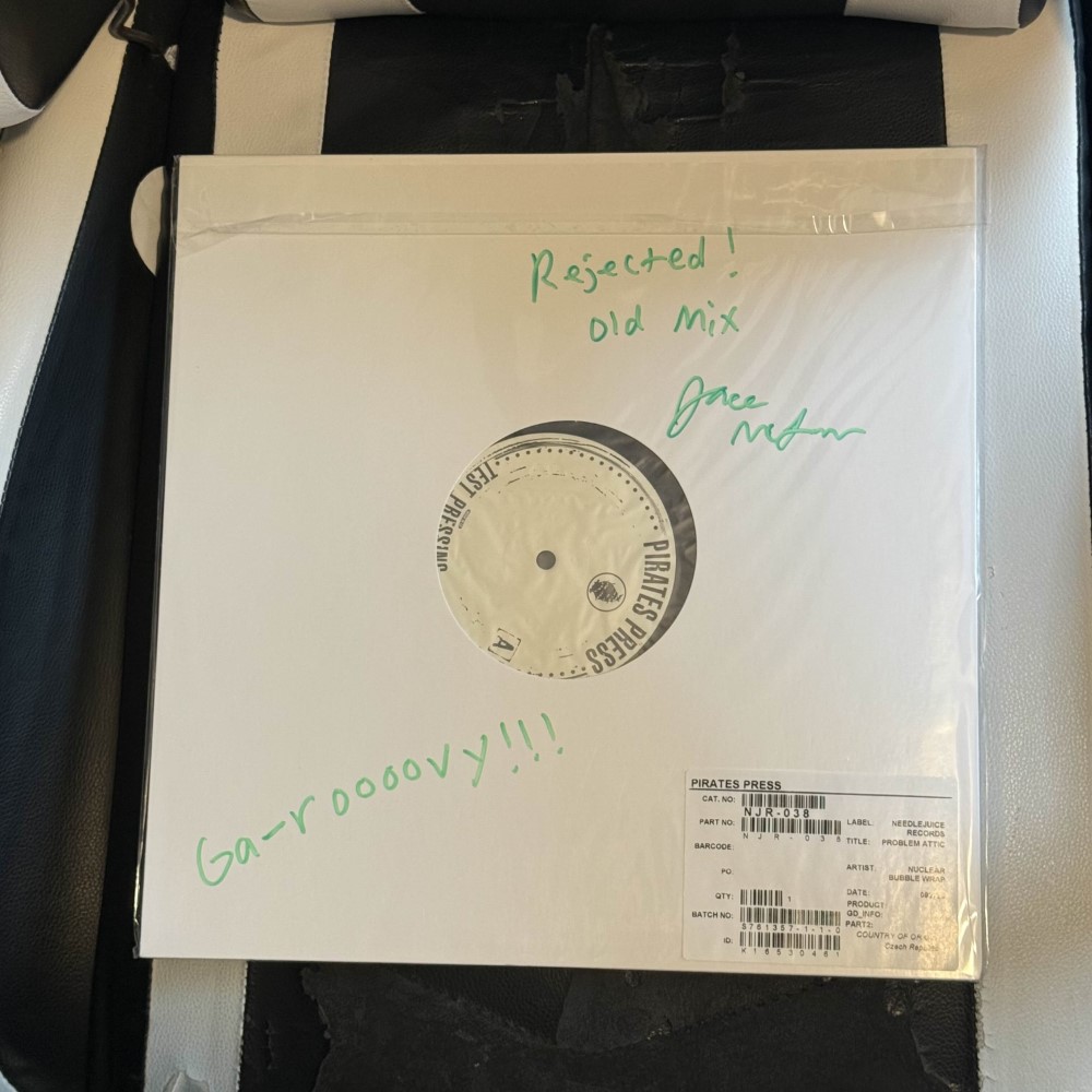 Photograph of a test pressing of Problem Attic by Nuclear Bubble Wrap
