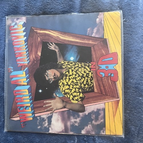 Photograph of an LP of In 3-D by Weird Al Yankovic