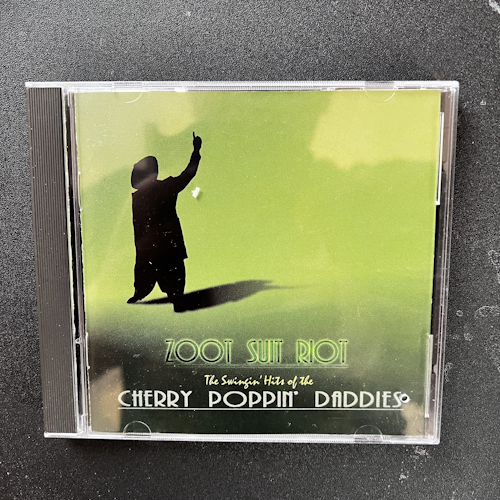 Photograph of a CD of Zoot Suit Riot: The Swingin' Hits Of The Cherry Poppin' Daddies