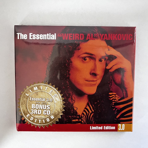 Photograph of a CD of The Essential Weird Al Yankovic 3.0 by Weird Al Yankovic