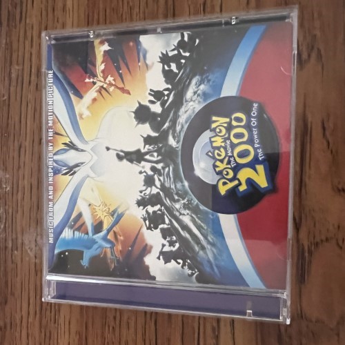 Photograph of a CD of Pokemon 2000: The Power Of One Soundtrack