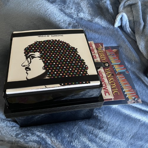 Photograph of a CD of The Essential Weird Al Yankovic 3.0 by Weird Al Yankovic