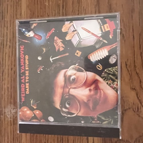 Photograph of a CD of Dare to be Stupid by Weird Al Yankovic