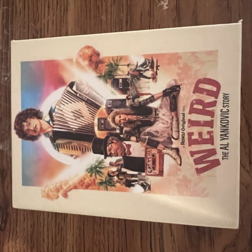 Photograph of a 4K Blu-Ray of Weird: The Al Yankovic Story by Weird Al Yankovic and Eric Appel